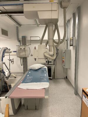 Philips Optimus 50 Bucky System *Mfd - 1998* Including Patient Table, Wall Stand, X-ray Overhead Bucky and Tube, Generator, Operator Console and Ceiling Rails. Not Powered Up, Sold as Untested, System has been Professionally De-Installed. (Stock Photo Use