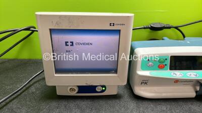 Mixed Lot Including 1 x Covidien BIS Complete Monitoring System (Powers Up with Cracked Screen) 1 x Alaris PK Infusion Pump (Powers Up) 1 x Laerdal Suction Unit (Powers Up with Cracked Casing and Missing Cup-See Photos) - 2