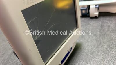 Mixed Lot Including 1 x Covidien BIS Complete Monitoring System (Powers Up with Cracked Screen) 1 x Alaris PK Infusion Pump (Powers Up) 1 x Laerdal Suction Unit (Powers Up with Cracked Casing and Missing Cup-See Photos) - 5