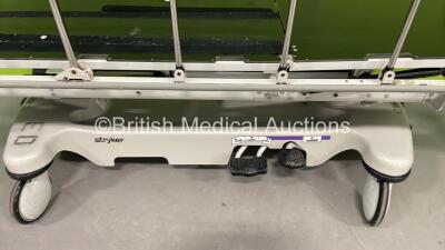 1 x Stryker Transport Patient Trolley (Hydraulics Tested Working) and 1 x Oxylitre Mobile Suction System (Powers Up) - 2