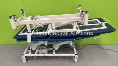 1 x Bristol Maid Electric Patient Examination Couch with Controller (Powers Up) and 1 x Huntleigh Hydraulic Patient Examination Couch (Hydraulics Tested Working)