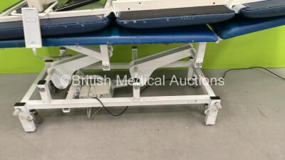 1 x Bristol Maid Electric Patient Examination Couch with Controller (Powers Up) and 1 x Huntleigh Hydraulic Patient Examination Couch (Hydraulics Tested Working) - 2