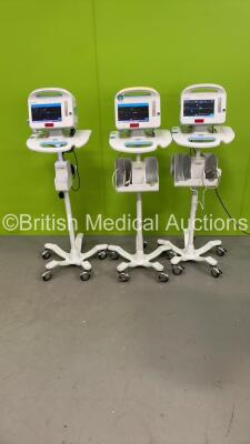 3 x Welch Allyn 6000 Vital Signs Monitors on Stands (All Power Up)