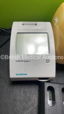 Mixed Lot Including 1 x Siemens Clinitek Status + Analyzer (Untested Due to Missing Power Supply) 1 x VearthonREF 0400-0130 Battery Charger, 2 x Nellcor N-550 Pulse Oximeters (Both Power Up) 1 x Hill Rom Model 104 Airway Clearance System (Powers Up) - 2