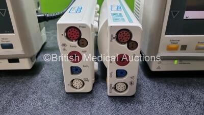 Job Lot Including 2 x Philips M3046A Patient Monitors (Both Power Up 1 x with Missing Module Clip - See Photo) and 2 x Philips M3001A ModuleS Including ECG, SpO2, NBP, Press and Temp Options *SN DE51299358 / DE22729898 / DE00850692 / DE00850695* - 4