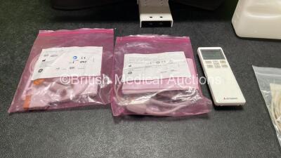 Mixed Lot Including 1 x Joimax JFMS2400 Flat Screen Monitor (Untested Due to Missing Power Supply) 1 x Olympus MAJ-1603 Flushing Pump, 1 x Mitsubishi Remote Controller and 3 x Patient Monitoring Cables *SN RLA502A700C, 091842* - 2