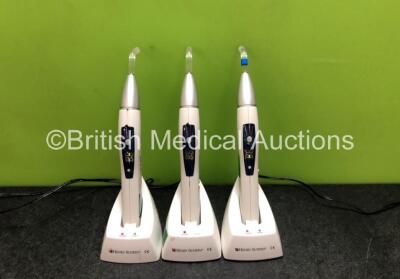 3 x Henry Schein HS-LED Light 1200 Cordless Curing Lights with 3 x Docking Stations and 3 x Power Supplies (All Power Up, 2 x Damaged Casing, 1 x Missing Button - See Photos)