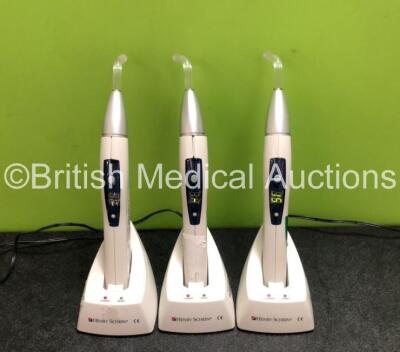 3 x Henry Schein HS-LED Light 1200 Cordless Curing Lights with 3 x Docking Stations and 3 x Power Supplies (All Power Up, 1 x Damaged Casing - See Photos)