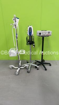 Mixed Lot Including 1 x Luxtec Super Charged Xenon Series 9000 Model 9300 Light Source. 1 x Welch Allyn Spot Vital Signs Monitor on Stand and 1 x F&P Airvo 2 Stand and Hose (All Power Up) *032901 / 200706127