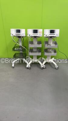 3 x Huntleigh Sonicaid FM800 Encore Fetal Monitors on Stands with 3 x TOCO and 3 x US Transducers (All Power Up) *751DX0501241-12*