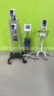 Mixed Lot Including 1 x Anetic Aid 4000 Series Tourniquet on Stand, 1 x Mindray VS-800 Monitor on Stand and CardinalHealth DS Docking Station with 2 x CareFusion VP Plus Guardrails Infusion Pumps (All Power Up) *BY83105137 / AET.01.01*