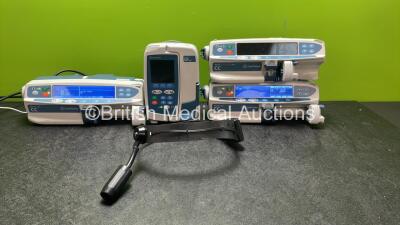 Mixed Lot Including 1 x Carefusion Alaris GP Plus Pump (Holds Power with Blank Screen) 2 x Carefusion Alaris CC Plus Infusion Pumps (Both Power Up) 1 x Alaris Guardrails Plus CC Pump (Holds Power with Blank Screen) 1 x Riester ri-focus LED Headlight (Unte