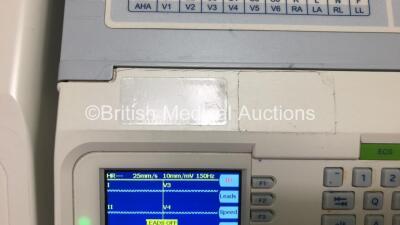 2 x Mortara ELI 250c ECG Machines (1 x Powers Up, 1 x Draws Power, 2 x Damage to Casing - See Photos) *SN 115030241801 / 115030241805* - 4