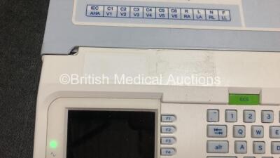 2 x Mortara ELI 250c ECG Machines (1 x Powers Up, 1 x Draws Power, 2 x Damage to Casing - See Photos) *SN 115030241801 / 115030241805* - 6