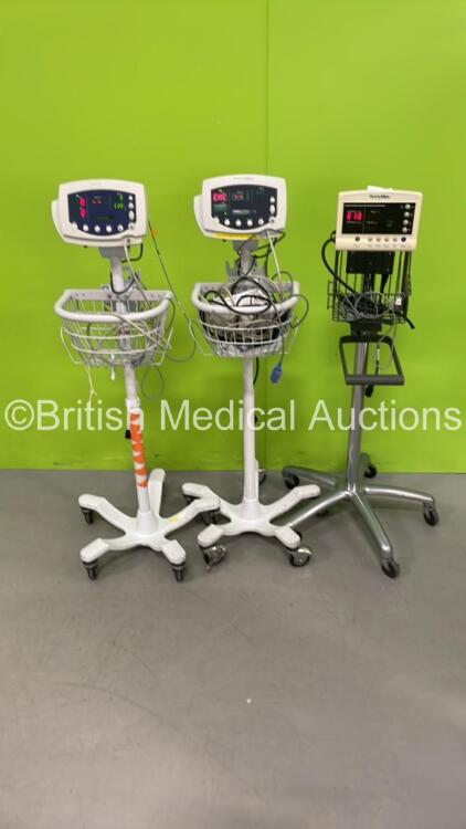 1 x Welch Allyn 52000 Series Patient Monitor on Stand and 2 x Welch Allyn 53N00 Vital Signs Monitors on Stands (All Power Up) *S/N 200303955 / JA125996 / JA068598*