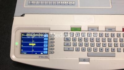 2 x Mortara ELI 250c ECG Machines (Both Power Up with Damage to Casing - See Photos) *SN 115050243732 / 114400231388* - 3