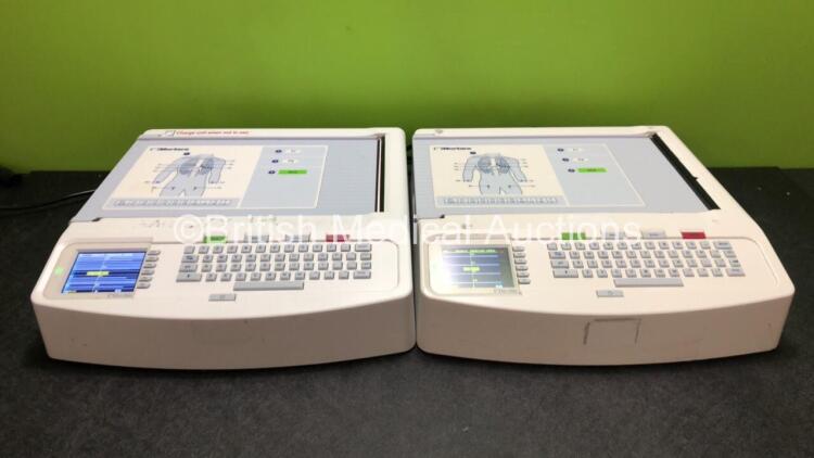 2 x Mortara ELI 250c ECG Machines (Both Power Up with Damage to Casing, 1 x Faulty Screen - See Photos) *SN 117320582600 / 115050243734*