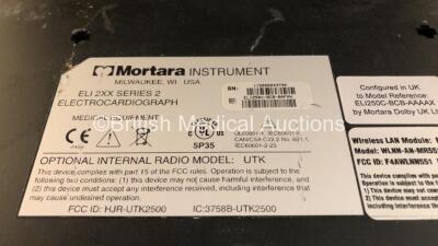 2 x Mortara ELI 250c ECG Machines (Both Power Up with Damage to Casing, 1 x Faulty Screen - See Photos) *SN 117320582600 / 115050243734* - 8