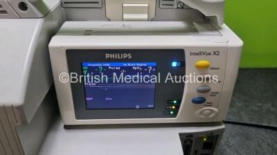 Job Lot Including 1 x Philips IntelliVue MP30 Patient Monitor (Powers Up Missing Dial - See Photo) and 2 x IntelliVue X2 Handheld Patient Monitors Including ECG, SpO2, NBP, Press and Temp Options (Both Power Up 1 x with Faulty Screen - See Photo) *SN DE83 - 4