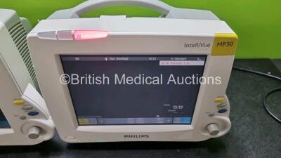 Job Lot Including 2 x Philips IntelliVue MP30 Patient Monitors (Both Power Up 1 x Slight Crack in Casing - See Photo) and 2 x Philips M3001A Modules Opt A01C06 Including ECG, SpO2, NBP, Press and Temp Options *SN DE717N0315 / DE3450DCRH / DE72847480 / DE7 - 3