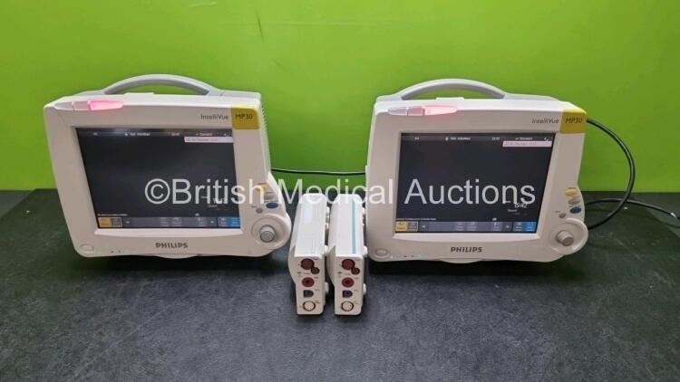 Job Lot Including 2 x Philips IntelliVue MP30 Patient Monitors (Both Power Up 1 x Slight Damage to Casing - See Photo) and 2 x Philips M3001A Modules Opt A01C06 Including ECG, SpO2, NBP, Press and Temp Options *SN DE907X1470 / DE717N0911 / DE72847461 / DE