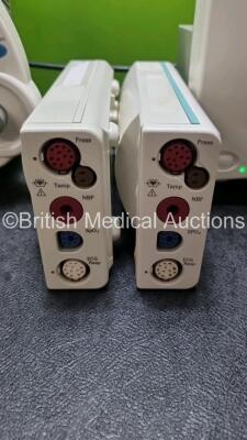 Job Lot Including 2 x Philips IntelliVue MP30 Patient Monitors (Both Power Up 1 x Slight Damage to Casing - See Photo) and 2 x Philips M3001A Modules Opt A01C06 Including ECG, SpO2, NBP, Press and Temp Options *SN DE907X1470 / DE717N0911 / DE72847461 / DE - 2