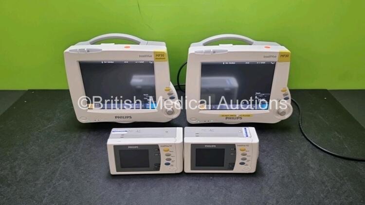 Job Lot Including 2 x Philips IntelliVue MP30 Patient Monitors (Both Power Up) and 2 x IntelliVue X2 Handheld Patient Monitors Including ECG, SpO2, NBP, Press and Temp Options (Both Power Up) *SN DE037C3942 / DE506J5252 / DE728B3767 / DE728B3821*