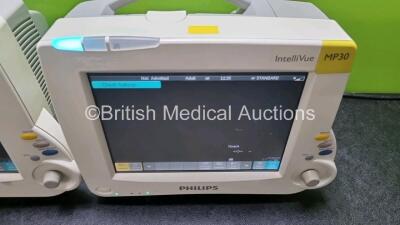 Job Lot Including 2 x Philips IntelliVue MP30 Patient Monitors (Both Power Up) and 2 x IntelliVue X2 Handheld Patient Monitors Including ECG, SpO2, NBP, Press and Temp Options (Both Power Up) *SN DE03758154 / DE037C4737 / DE72882350 / DE72882368* - 2