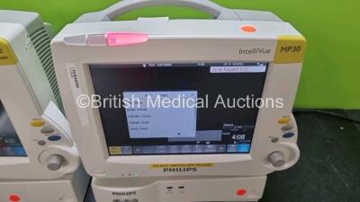 Job Lot Including 2 x Philips IntelliVue MP30 Patient Monitors (Both Power Up) 2 x Philips IntelliVue G5 M1019A Gas Module Including 2 x Water Traps (Both Power Up) and 2 x IntelliVue X2 Handheld Patient Monitors Including ECG, SpO2, NBP, Press and Temp - 3