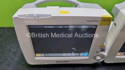 Job Lot Including 2 x Philips IntelliVue MP30 Patient Monitors (Both Power Up 1 x with Light Scratch In Screen - See Photo) and 2 x IntelliVue X2 Handheld Patient Monitors Including ECG, SpO2, NBP, Press and Temp Options (Both Power Up) *SN DE03758270 / D - 4