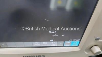 Job Lot Including 2 x Philips IntelliVue MP30 Patient Monitors (Both Power Up 1 x with Light Scratch In Screen - See Photo) and 2 x IntelliVue X2 Handheld Patient Monitors Including ECG, SpO2, NBP, Press and Temp Options (Both Power Up) *SN DE03758270 / D - 5