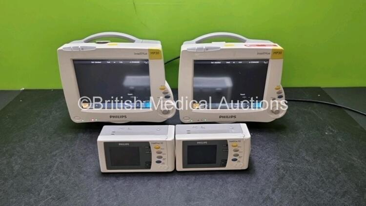 Job Lot Including 2 x Philips IntelliVue MP30 Patient Monitors (Both Power Up) and 2 x IntelliVue X2 Handheld Patient Monitors Including ECG, SpO2, NBP, Press and Temp Options (Both Power Up 1 x with Damage to Casing - See Photo) *SN DE315f1138 / DE037582