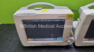 Job Lot Including 2 x Philips IntelliVue MP30 Patient Monitors (Both Power Up) and 2 x IntelliVue X2 Handheld Patient Monitors Including ECG, SpO2, NBP, Press and Temp Options (Both Power Up 1 x with Damage to Casing - See Photo) *SN DE315f1138 / DE037582 - 3