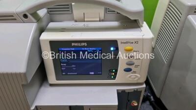 Job Lot Including 2 x Philips IntelliVue MP30 Patient Monitors (Both Power Up) and 2 x IntelliVue X2 Handheld Patient Monitors Including ECG, SpO2, NBP, Press and Temp Options (Both Power Up 1 x with Damage to Casing - See Photo) *SN DE315f1138 / DE037582 - 8