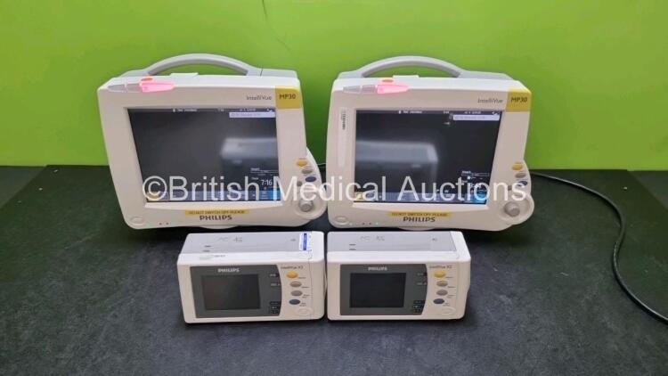 Job Lot Including 2 x Philips IntelliVue MP30 Patient Monitors (Both Power Up) and 2 x IntelliVue X2 Handheld Patient Monitors Including ECG, SpO2, NBP, Press and Temp Options (Both Power Up) *SN DE037B2735 / DE608J5238 / DE728B3829 / DE728B3820*