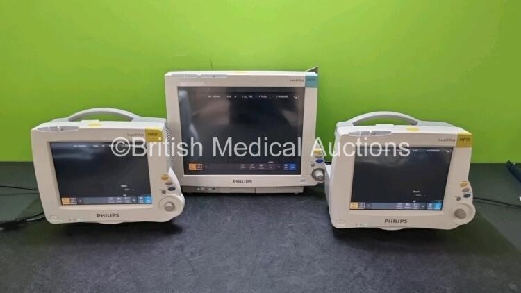 Job Lot Including 2 x IntelliVue MP30 Patient Monitors (Both Power Up 1 x with Light Scratching on Screen on Screen - See Photo) and 1 x IntelliVue MP70 Patient Monitor (Powers Up with Light Scratching On Screen - See Photo) *SN DE72882396 / DE72882369 /