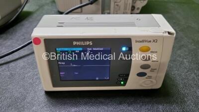 Job Lot Including 2 x IntelliVue MP30 Patient Monitors (Both Power Up Both with Light Scratching on Screen - See Photos) and 2 x IntelliVue X2 Handheld Patient Monitors Including ECG, SpO2, NBP, Press and Temp Options (Both Power Up 1 x with Damage to Cas - 7