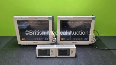 2 x Philips IntelliVue MP70 Patient Monitors (Both Power Up Both with Light Scratching on Screen - See Photo) with 2 x IntelliVue X2 Handheld Patient Monitors Including ECG, SpO2, NBP, Press and Temp Options (Both Power Up 1 x with Slight Damage to Casing