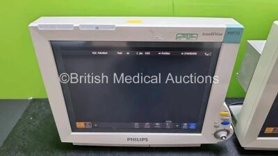 2 x Philips IntelliVue MP70 Patient Monitors (Both Power Up Both with Light Scratching on Screen and Missing Dials - See Photos) with 2 x IntelliVue X2 Handheld Patient Monitors Including ECG, SpO2, NBP, Press and Temp Options (Both Power Up Both with Sli - 6