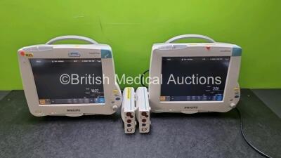 Job Lot Including 2 x Philips IntelliVue MP50 Patient Monitors (Both Power Up) and 2 x Philips M3001A OPT A01C06 Modules Including ECG, SpO2, NBP, PRESS and TEMP Options *SN DE717N4113 / DE907D7011 / DE44025423 / DE72848902*