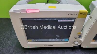 Job Lot Including 2 x IntelliVue MP30 Patient Monitors (Both Power Up Both with Light Scratching on Screen - See Photos) and 2 x IntelliVue X2 Handheld Patient Monitors Including ECG, SpO2, NBP, Press and Temp Options (1 x No Power with Damage to Screen - - 5