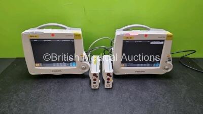 Job Lot Including 2 x Philips IntelliVue MP30 Patient Monitors (Both Power Up 1 x Slight Crack in Casing - See Photo) and 2 x Philips M3001A OPT A01C06 Modules Including ECG, SpO2, NBP, PRESS and TEMP Options *SN DE717M4114 / DE907U4194 / DE72873375 / DE