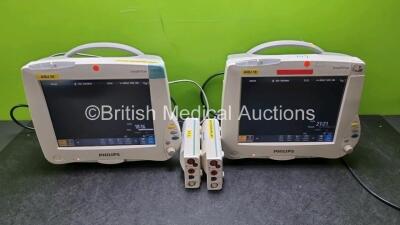 Job Lot Including 2 x Philips IntelliVue MP50 Patient Monitors (Both Power Up 1 x with Missing Casing - See Photo) and 2 x Philips M3001A OPT A01C06 Modules Including ECG, SpO2, NBP, PRESS and TEMP Options *SN DE717R3707 / DE512B7635*