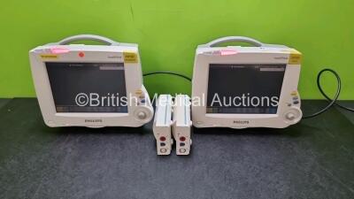 Job Lot Including 2 x Philips IntelliVue MP20 Patient Monitors (Both Power Up 1 x with Crack in Casing - See Photo) and 2 x Philips M3001A OPT A01 Modules Including ECG, SpO2 and NBP Options *SN DE632H688 / DE512B7935 / DE62225730*