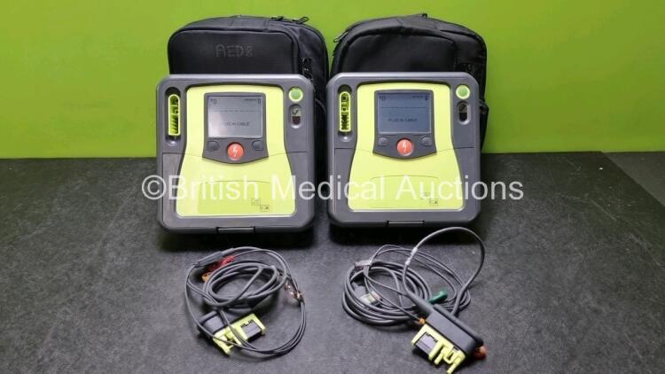 2 x Zoll AED PRO Defibrillators with 2 x Batteries, 2 x 3 Lead ECG Leads (Both Power Up)