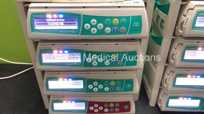 8 x B. Braun Infusomat Space Infusion Pumps with 2 x Space Station Docking Stations and 2 x Power Supplies (All Power Up) *SN 449062 / 449435 / 465315449295 / 465335 / 449421 / 465307 / 449304* - 2