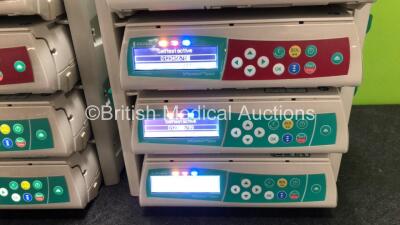 8 x B. Braun Infusomat Space Infusion Pumps with 2 x Space Station Docking Stations and 2 x Power Supplies (All Power Up) *SN 449515 / 449275 / 449447 / 449507 / 449542 / 449281 / 449644 / 449030* - 2