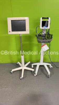 1 x Brainz BRM2 Monitor on Stand and 1 x SunTech CT40 Patient Monitor on Stand (Powers Up) *S/N BRM-2004-1027*