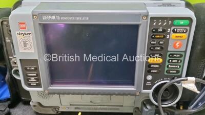 Medtronic Physio Control Lifepak 15 12-Lead Defibrillator / Monitor *Mfd - 2015* Ref 99577-001388, P/N V15-5-00001 with Pacer, CO2, SPO2, NIBP, ECG, Auxiliary Power and Printer Options, 1 x 6 Lead ECG Lead, 1 x 4 Lead ECG Lead, 2 x NIBP Hose and Cuff, 1 x - 2