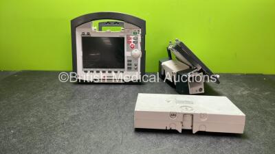 Job Lot Including 1 x SS Corpuls Corpuls3 REF 04100 Display Unit (Holds Power with Blank Display and Damaged Casing-See Photos) 2 x SS Corpuls Corpuls3 REF 04301 Defib Corpuls SLIM Battery Packs (1 Powers Up, 1 Spares and Repairs) 1 x SS Corpus Corpuls3 R